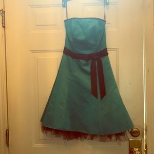 Fun teal dress with black bow!